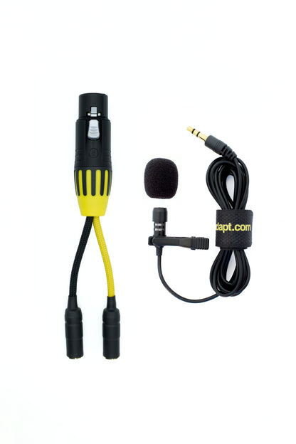Bolero talkback adapter kit with yellow boot and two 3.5mm TRS sockets, shown alongside a clip-on lavalier microphone, foam windshield, and coiled cable with 3.5mm TRS plug.